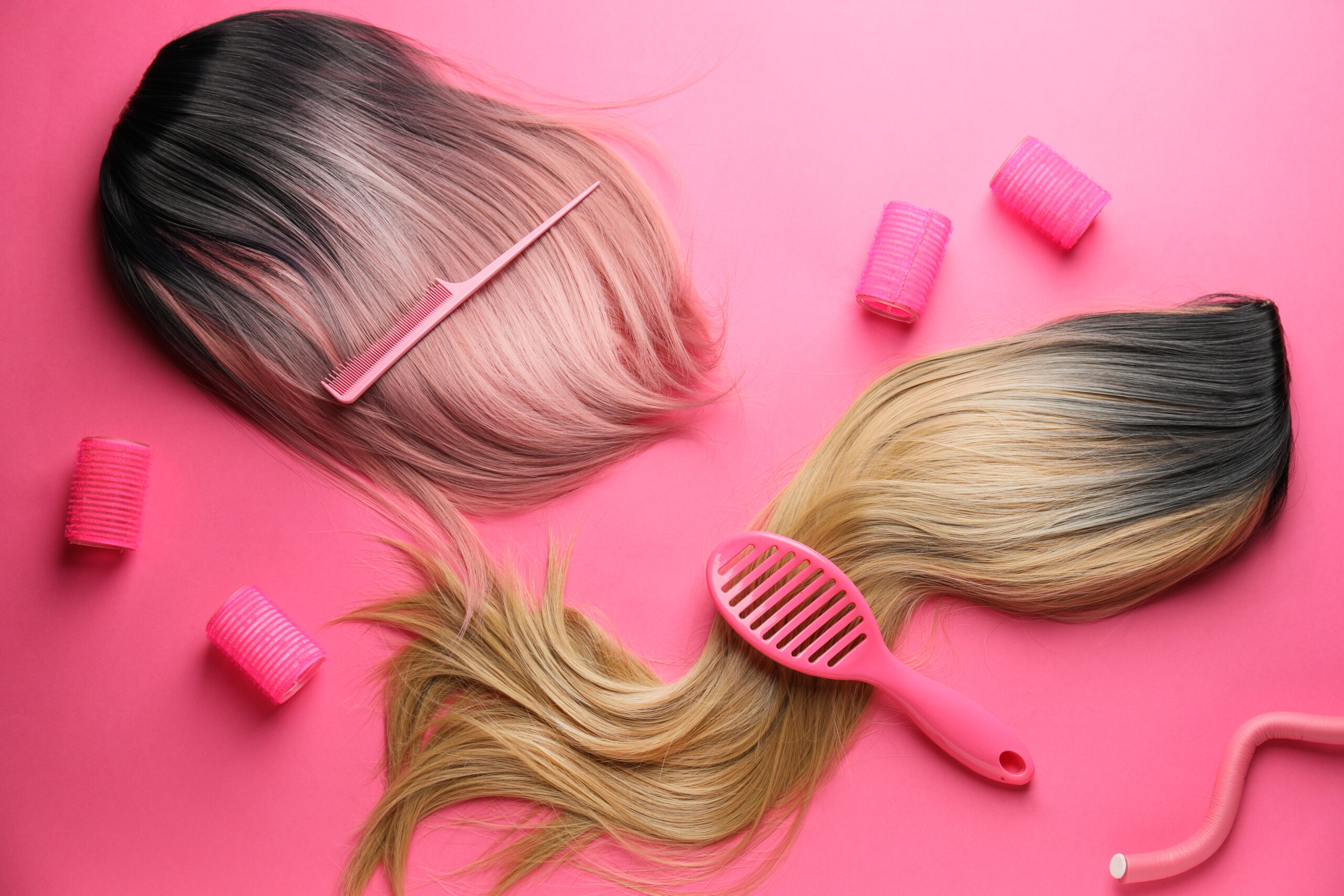 Female,Wigs,,Brush,,Comb,And,Curlers,On,Color,Background